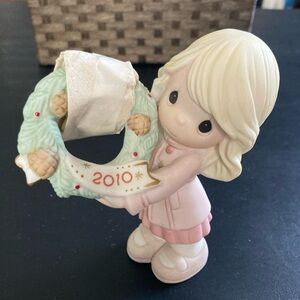 Precious Moments Girl Figurine Holding Mint Green Wreath with Pink Outfit